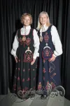 Sisters; Ann (Ruud) Kolzing, Associate Member, MØRE OG ROMSDAL- Sunnmøres  with Norddal embroidery,   Janet Ruud, Embla #2, MØRE OG ROMSDAL- Sunnmøres with Ørskog embroidery.